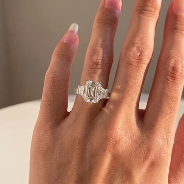 Emerald Cut Diamond Three Stone Ring With Shield Side Stones