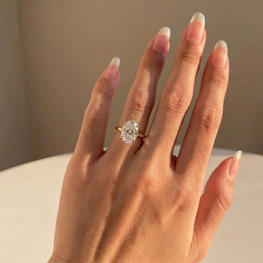 4 Prong Solitaire Oval Cut Diamond Engagement Ring 3mm Band