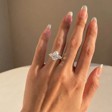 Pear Cut Three Stone Engagement Ring with Pear Side Stones