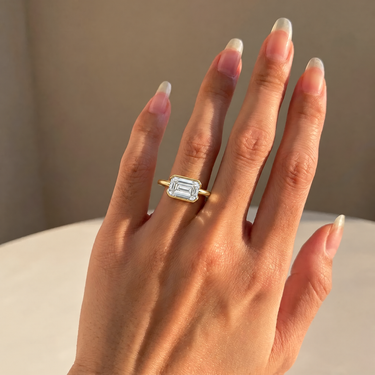 East West Half Bezel Emerald Cut Diamond Engagement Ring