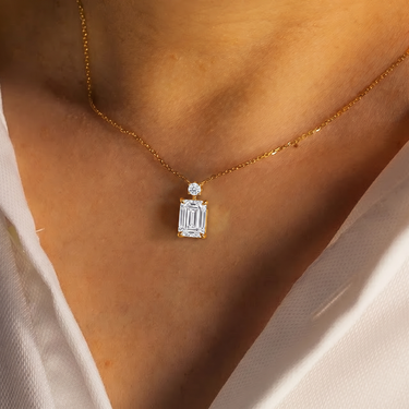 Emerald and Round Cut Diamond Pendant Necklace