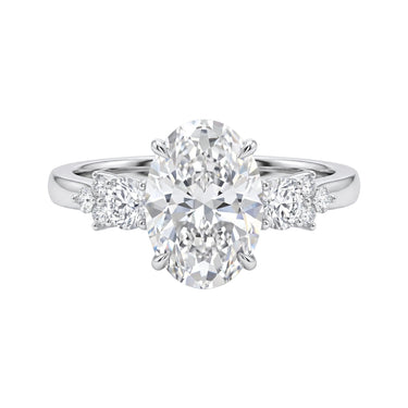 Oval Diamond Ring With Round And Marquise Shaped Side Stones