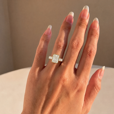 Radiant Cut Diamond Bezel Engagement Ring With Baguette Side Stones