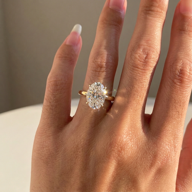 4 Prong Solitaire Oval Cut Diamond Engagement Ring 3mm Band