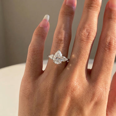 Pear Cut Three Stone Engagement Ring with Pear Side Stones