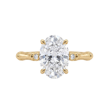Oval Cut Diamond Engagement Ring With Bamboo Band