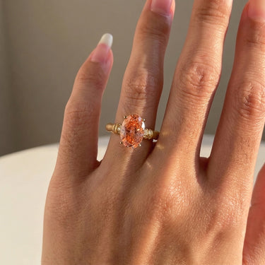 Oval Pink Diamond Ring with Brushed Bamboo Inspired Setting