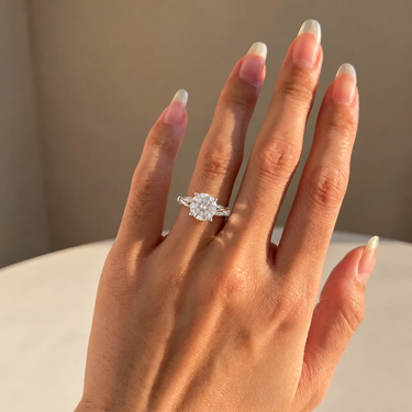 Round Brilliant Twisted Shank Diamond Engagement Ring