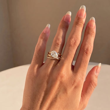 East West Pear Cut Diamond Ring With Triple Wrap Band