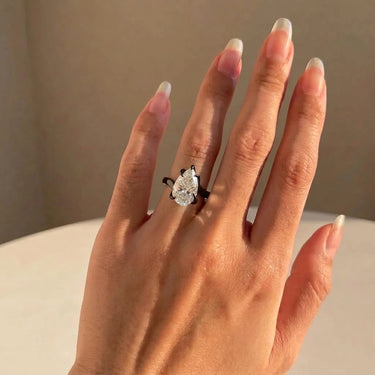 Pear Cut Diamond Thorn Engagement Ring In Black Gold